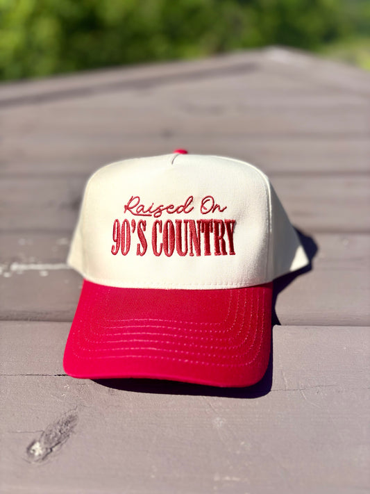 “Raised on 90’s Country” Trucker Hat- red